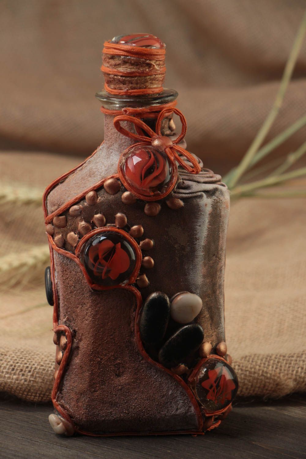 Handmade designer painted bottle decorated with genuine leather and stones photo 1