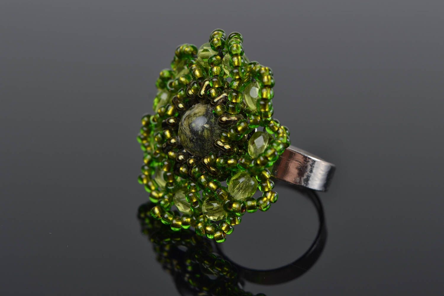 Handmade green ring made of seed beads with natural stone of unusual shape
 photo 1