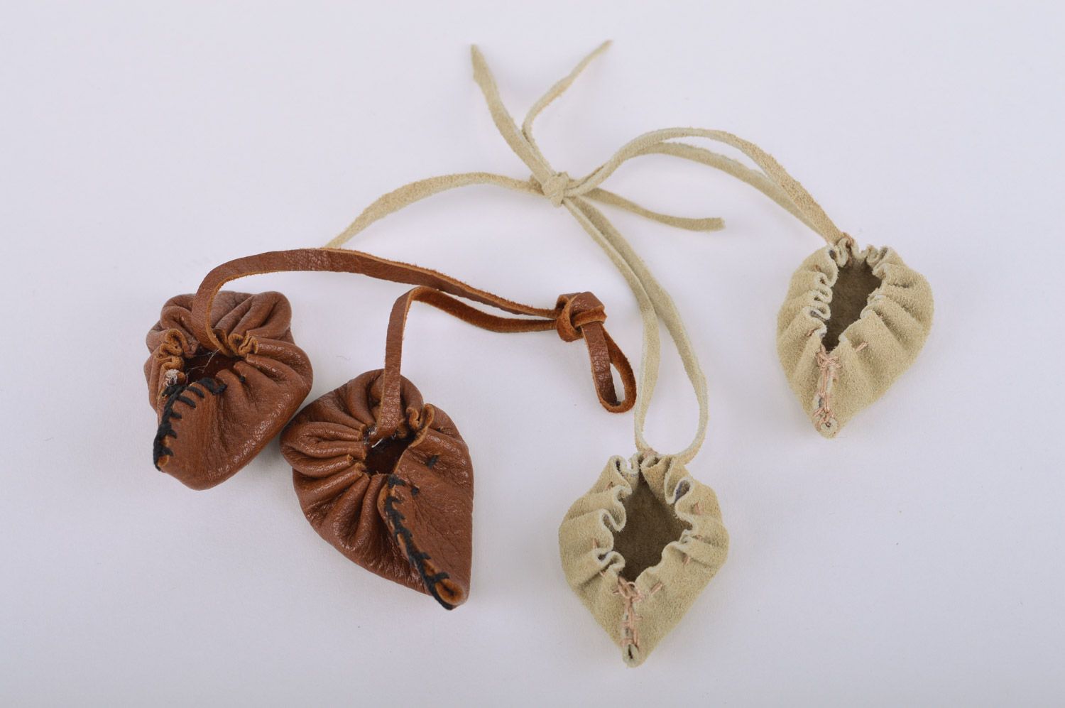 Set of handmade leather keychains 2 items brown key accessories in the shape of bast shoes photo 2