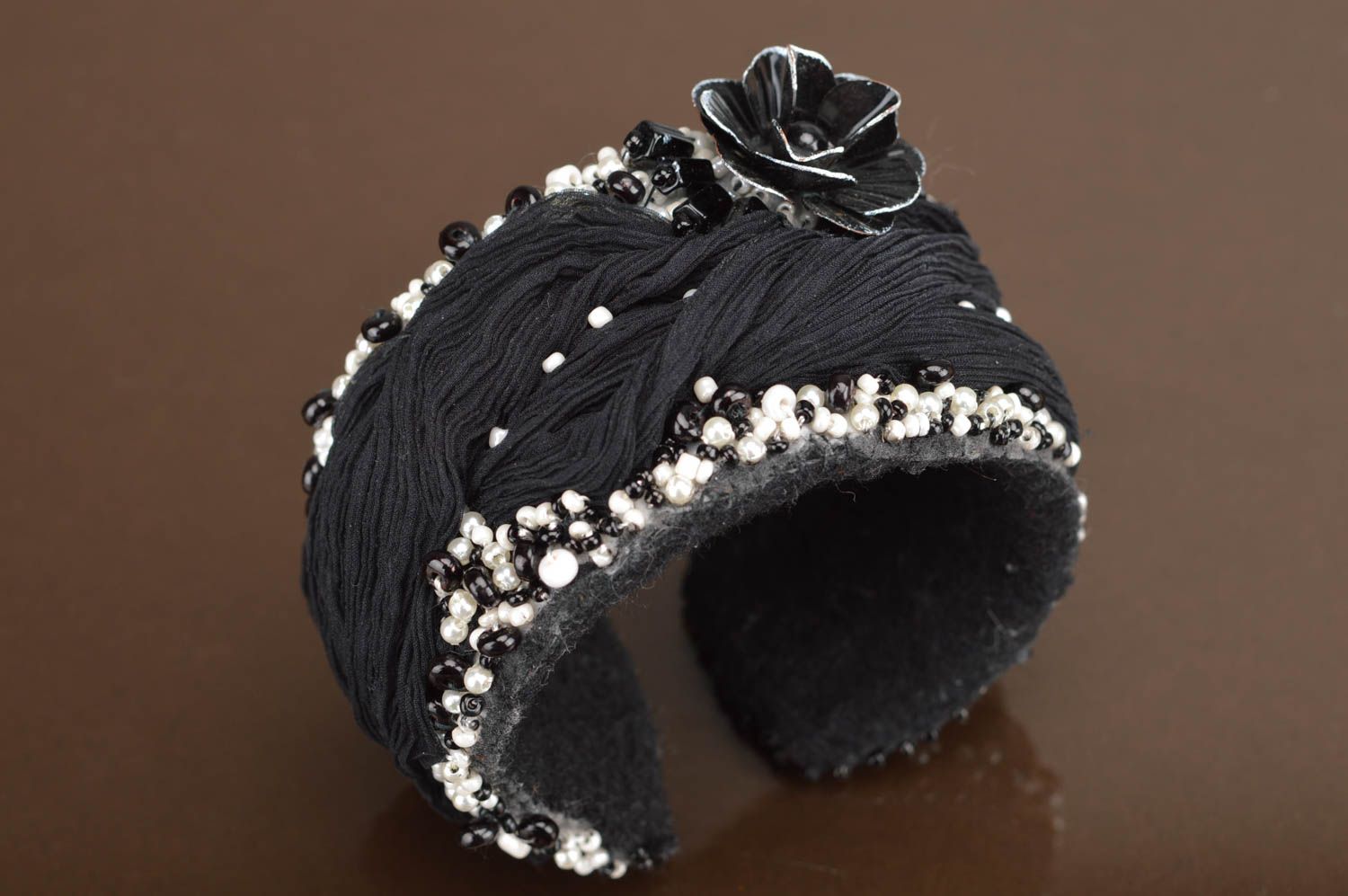 Fabric handmade wide bracelet in black color decorated with flower and beads photo 2