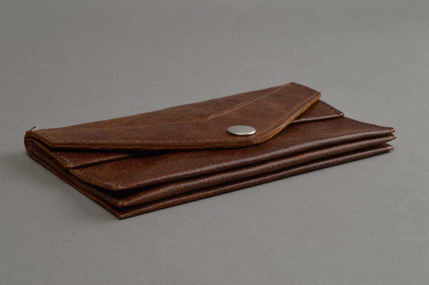 Большой бумажник из натуральной кожи ручной работы коричневый мужской авторский фото 2