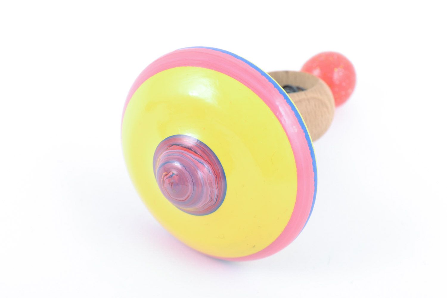 Handmade educational wooden eco toy spinning top painted in yellow color palette photo 3