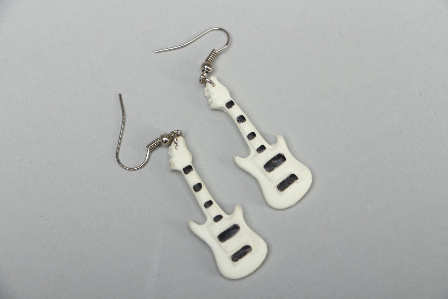 Polymer clay earrings in the shape of guitars photo 1