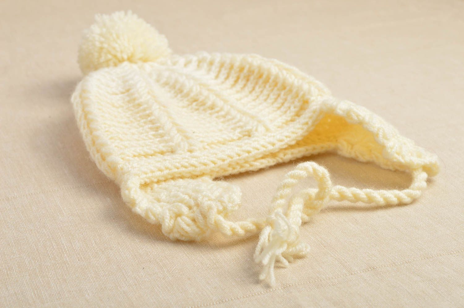 Bonnet tricot fait main Chapeau au crochet Vêtement enfant beau avec pompon photo 1