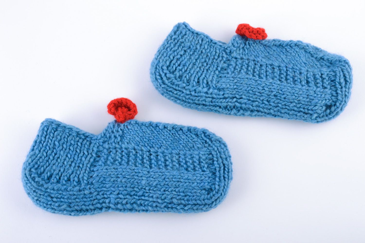 Handmade warm knitted half-woolen women's slippers of blue color with red knitted accessories photo 2