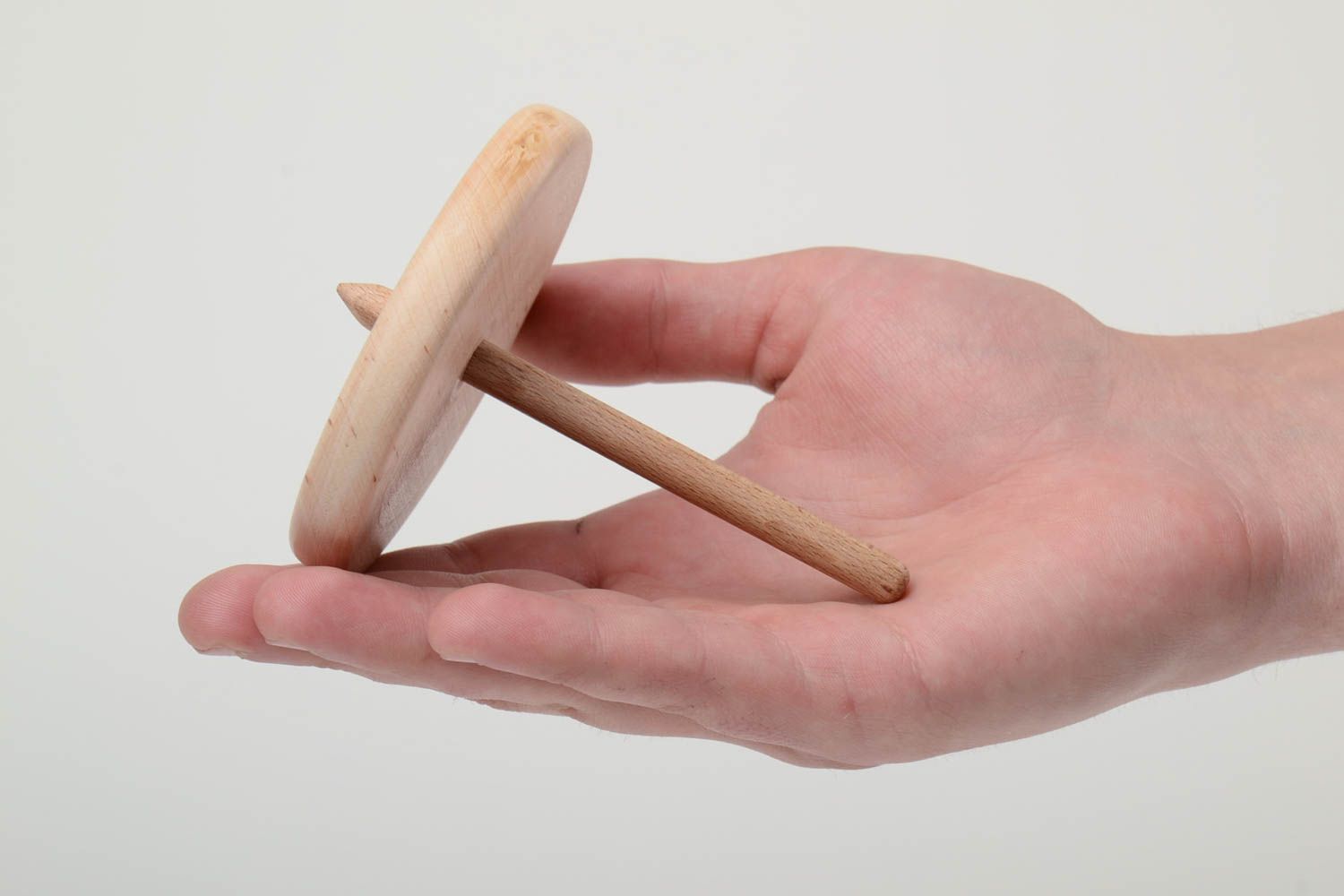 Peonza de madera hecha a mano y pulida juguete de desarrollo para niños  foto 5