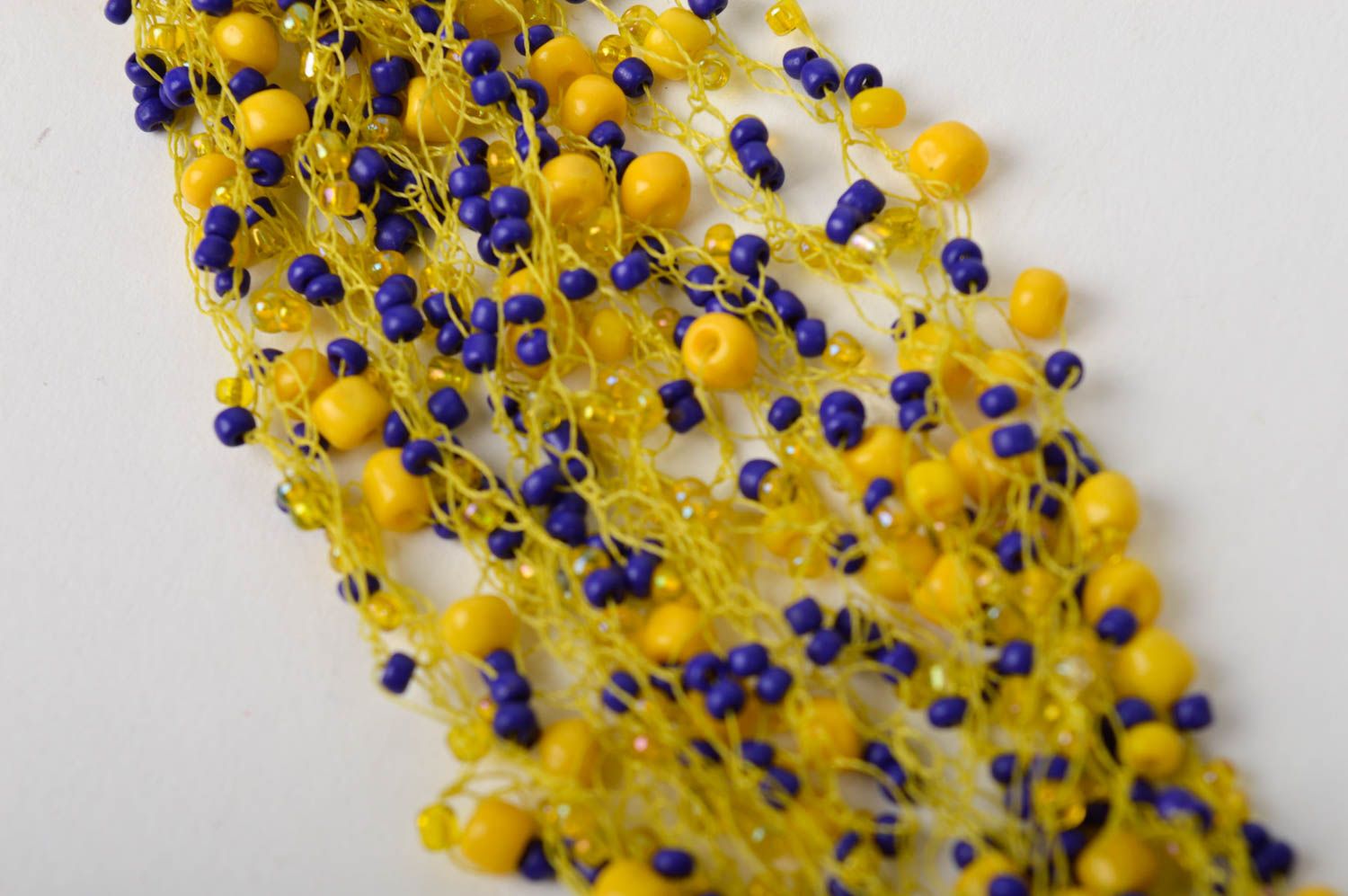 Yellow and blue beads bracelet on the thin yellow cord for women photo 4
