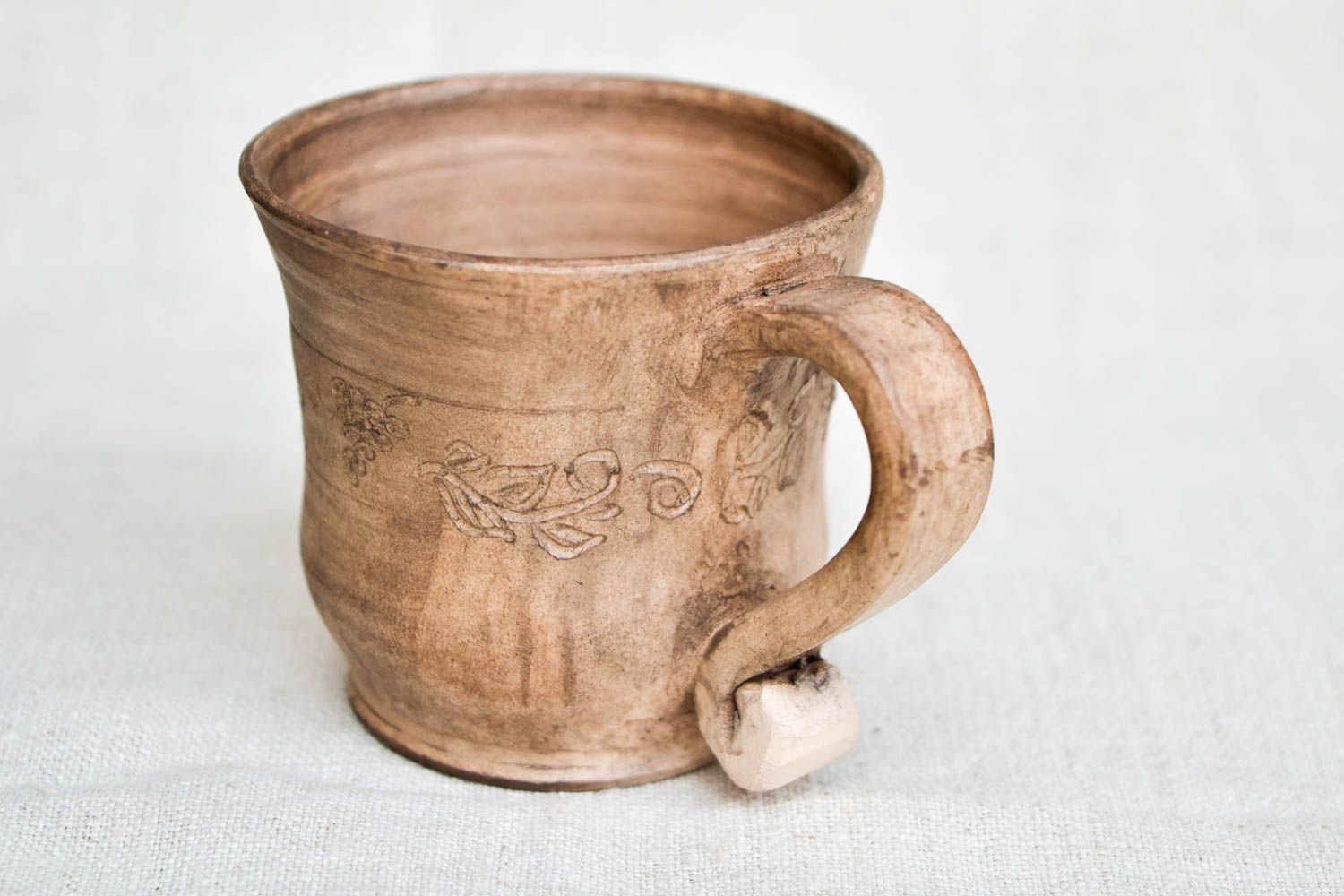 White clay rustic style handmade cup with floral pattern photo 4
