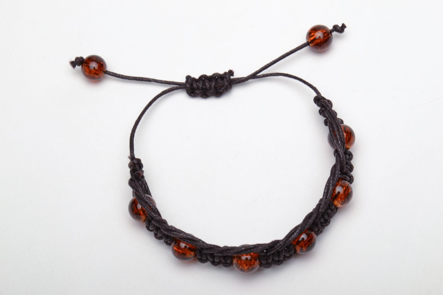 Bracelet with glass beads of amber color photo 2