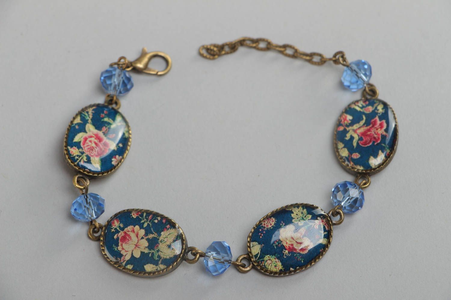 Beautiful stylish handmade glass glaze wrist bracelet of blue color with flowers photo 2