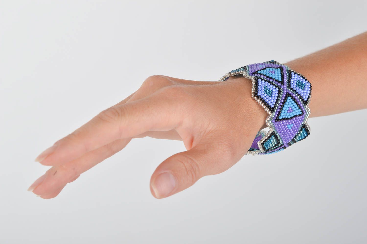 Art stylish beaded handmade bracelet in blue and purple colors for women photo 2