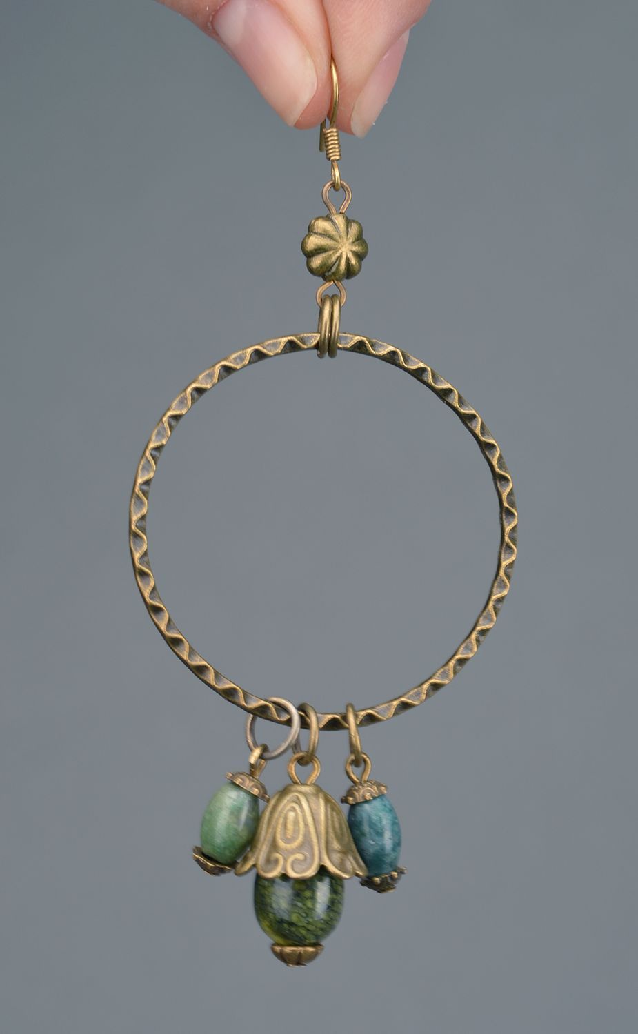 Handmade ring shaped metal dangle earrings with green beads charms photo 3