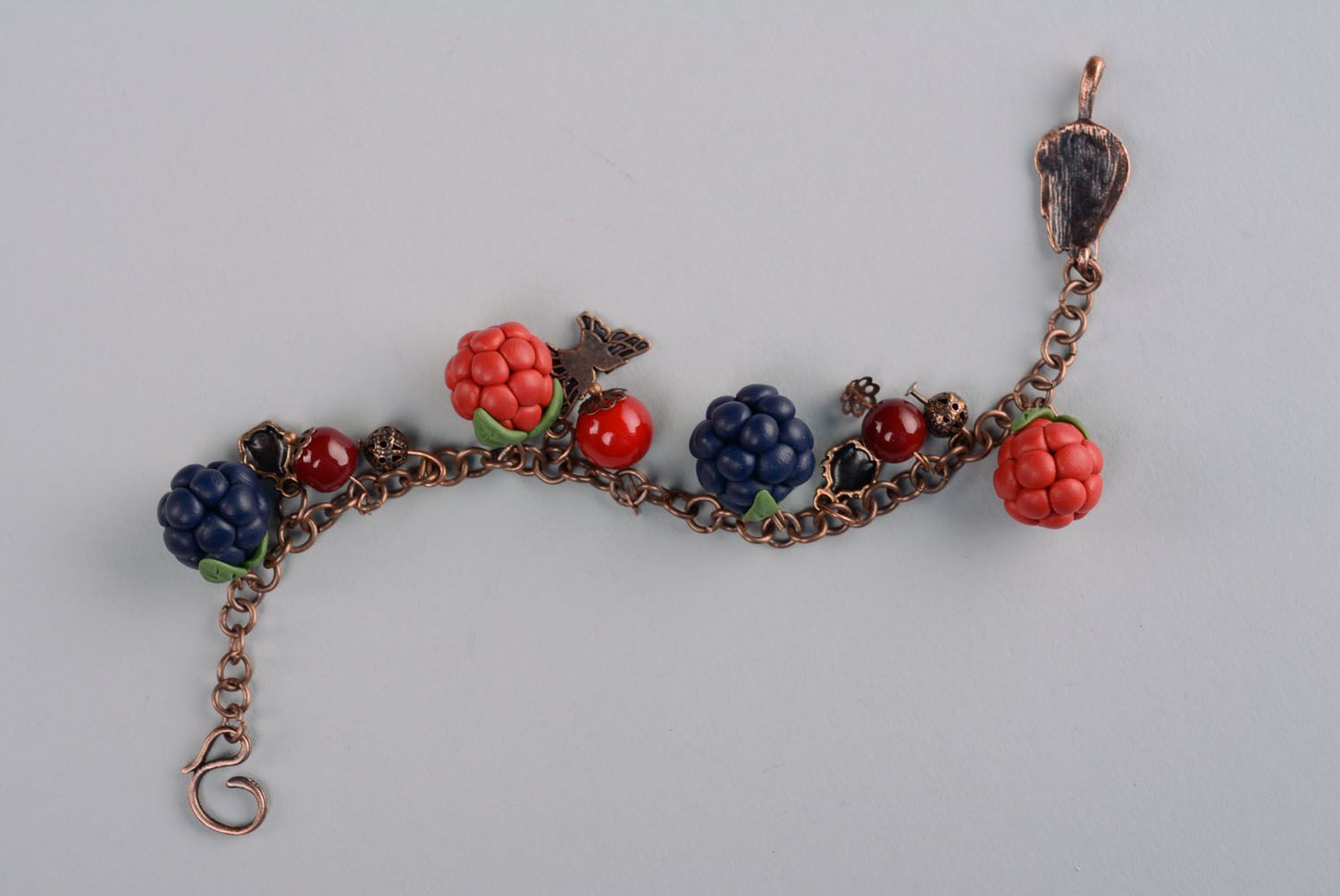 Plastic bracelet with charms in the shape of berries photo 1