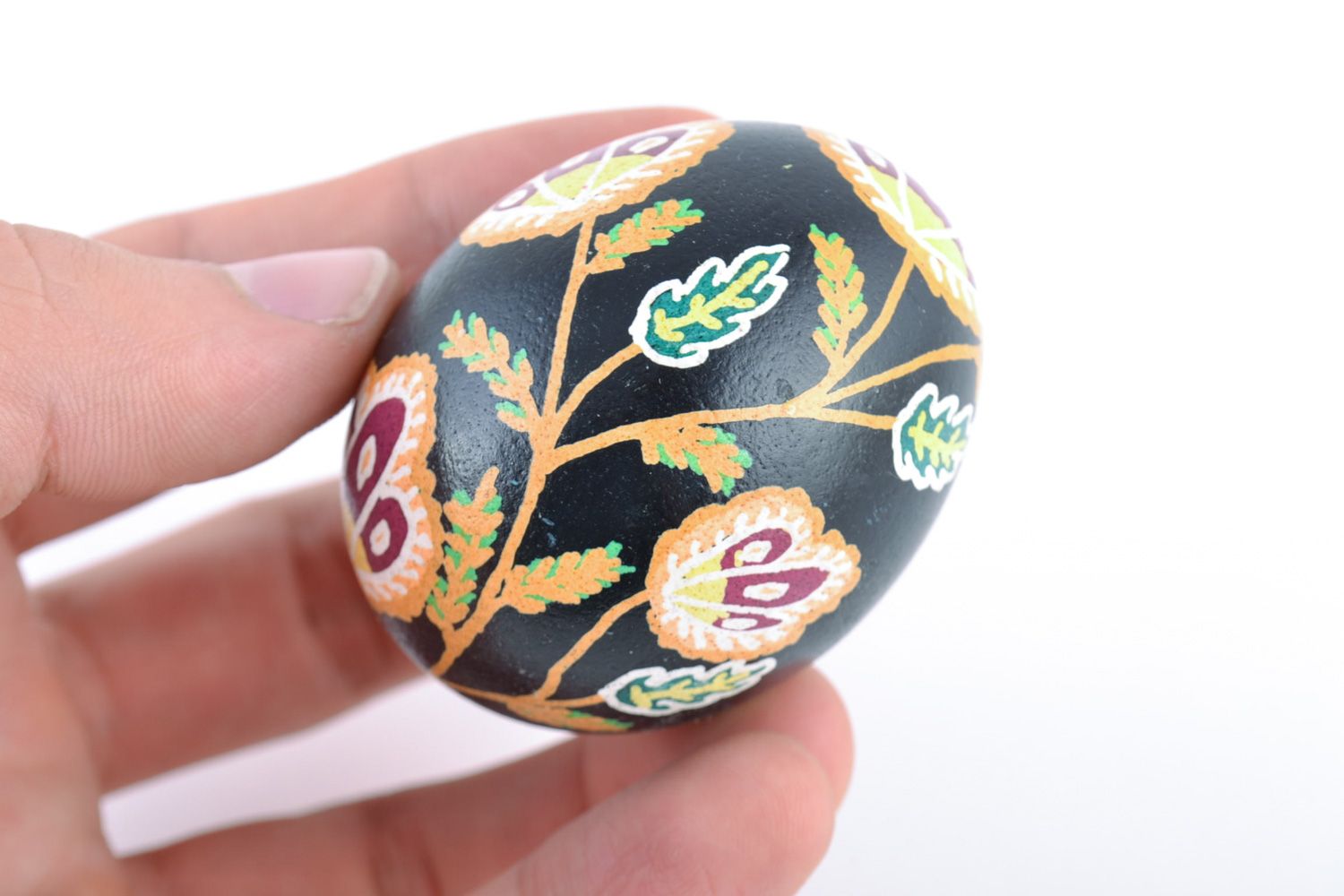 Handmade painted dark chicken Easter egg with flower pattern photo 2