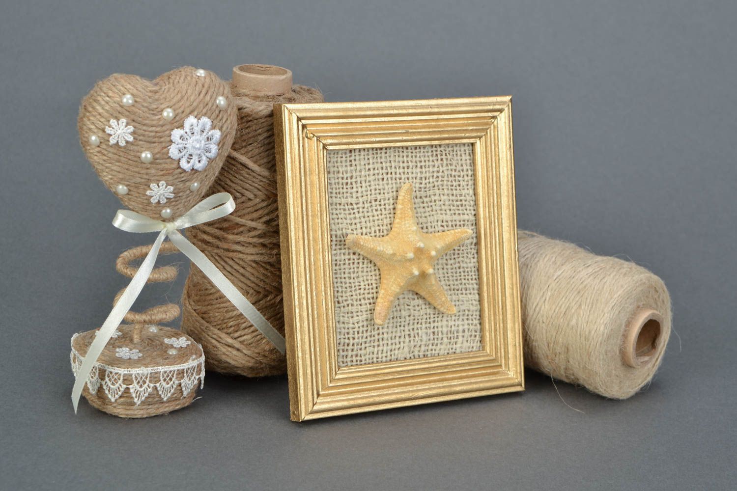 Handmade decorative wall panel on burlap basis in wooden frame with sea star photo 1