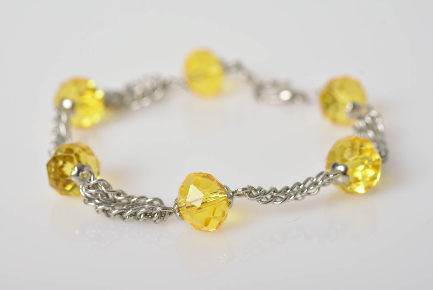 Handmade designer wrist bracelet with yellow glass beads and metal chain photo 1