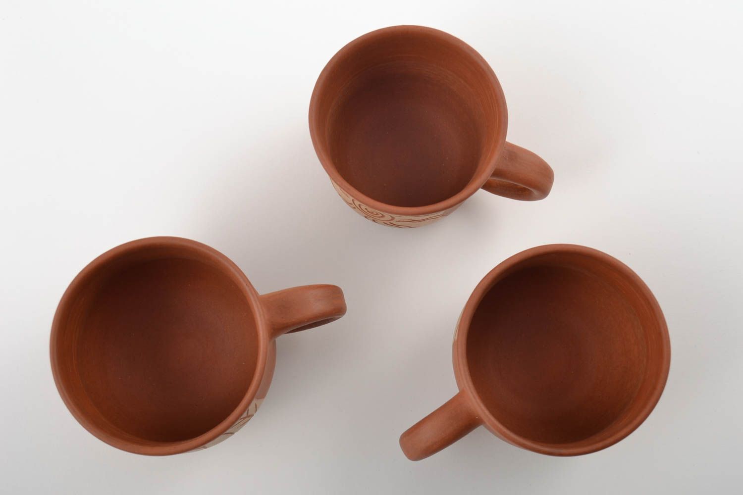 Set of three ceramic cups for coffee with cave drawings photo 2