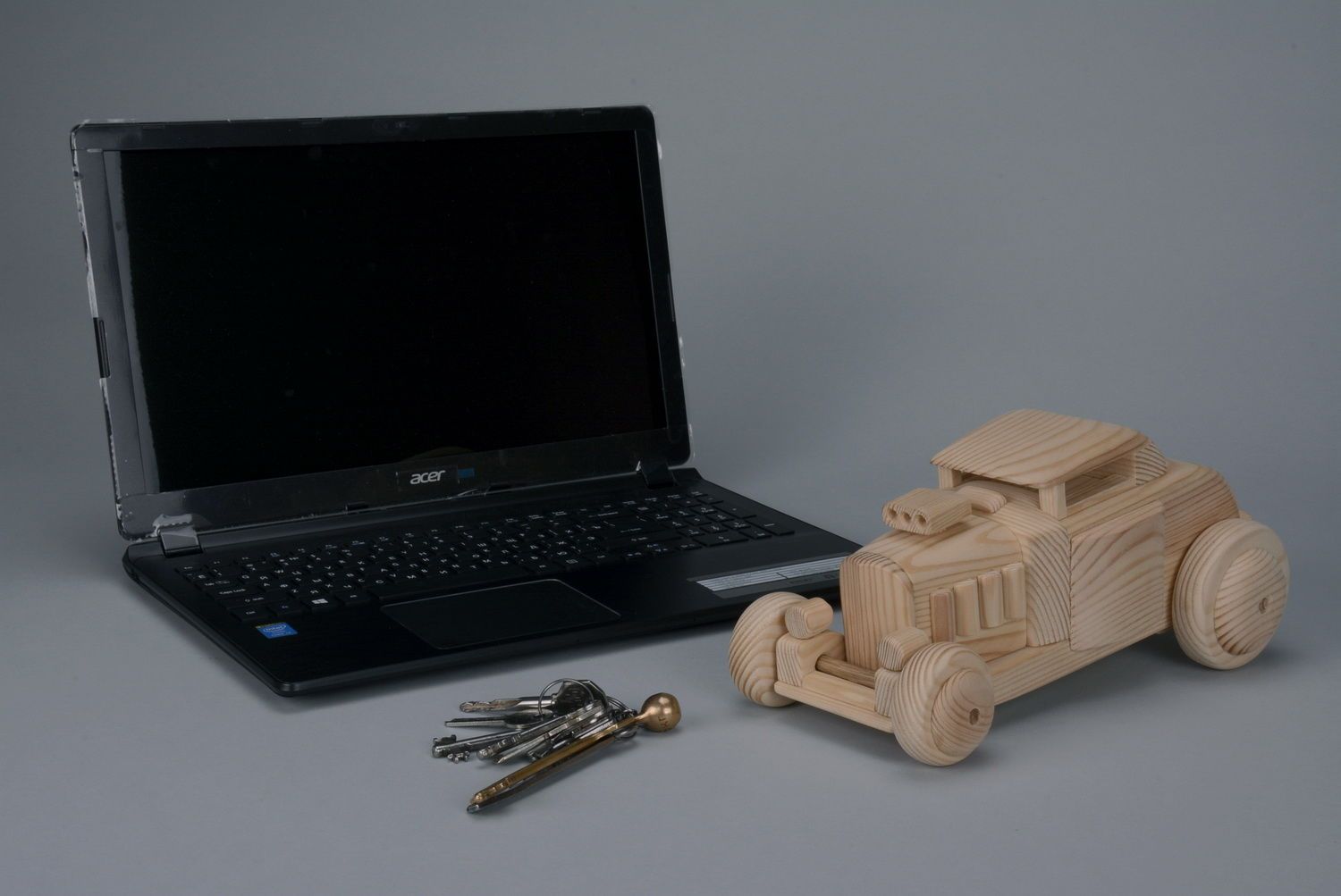 Toy car carved by hand of wood photo 5