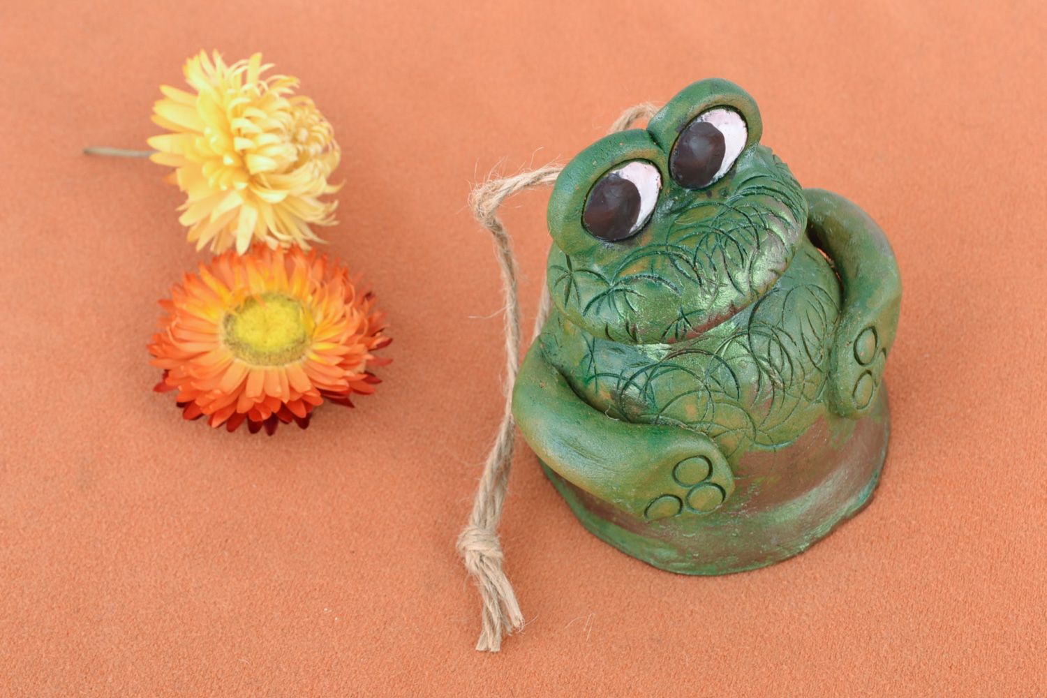 Small handmade funny decorative ceramic hanging bell in the shape of green frog photo 1