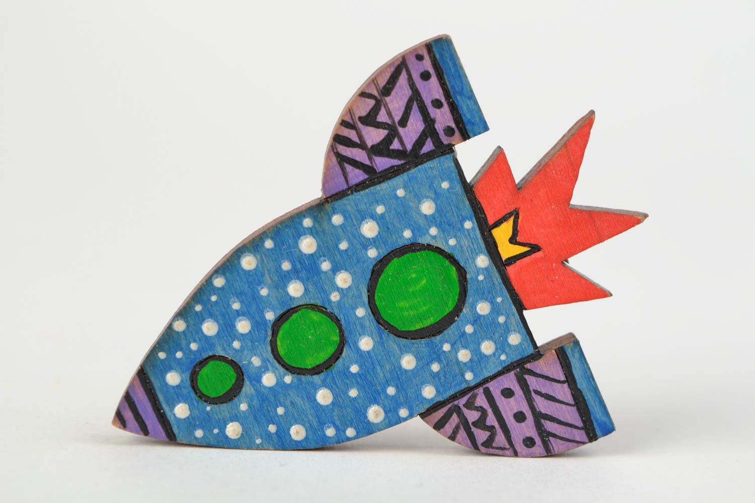 Handmade designer wooden brooch painted with acrylics in the shape of rocket photo 1