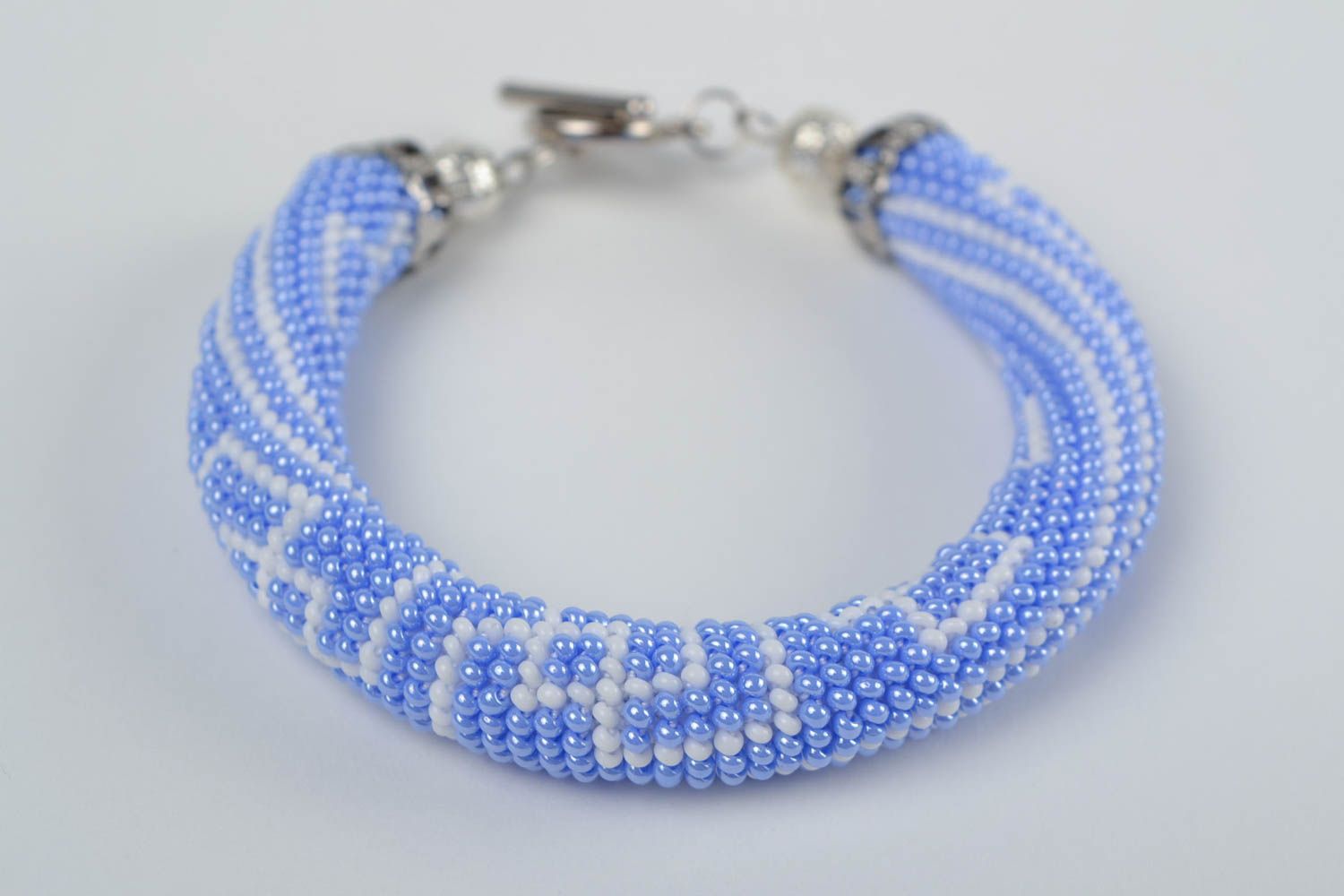 Designer handmade corded beaded beautiful bracelet in blue shades photo 4
