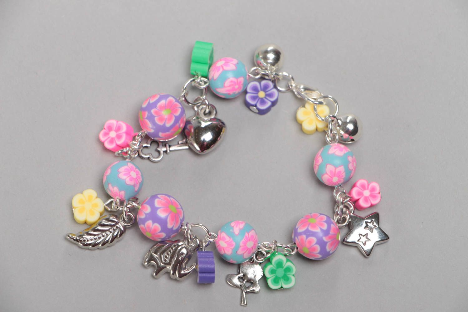 Bright colorful handmade children's polymer clay wrist bracelet with charms photo 3