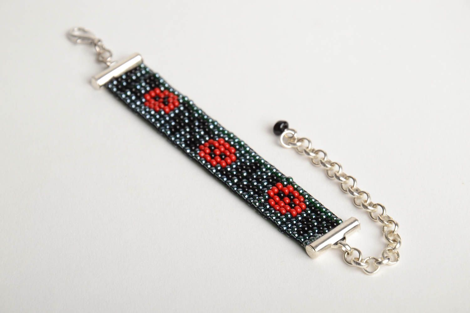 Black and red beads woven line wrist bracelet on a chain with poppies photo 5