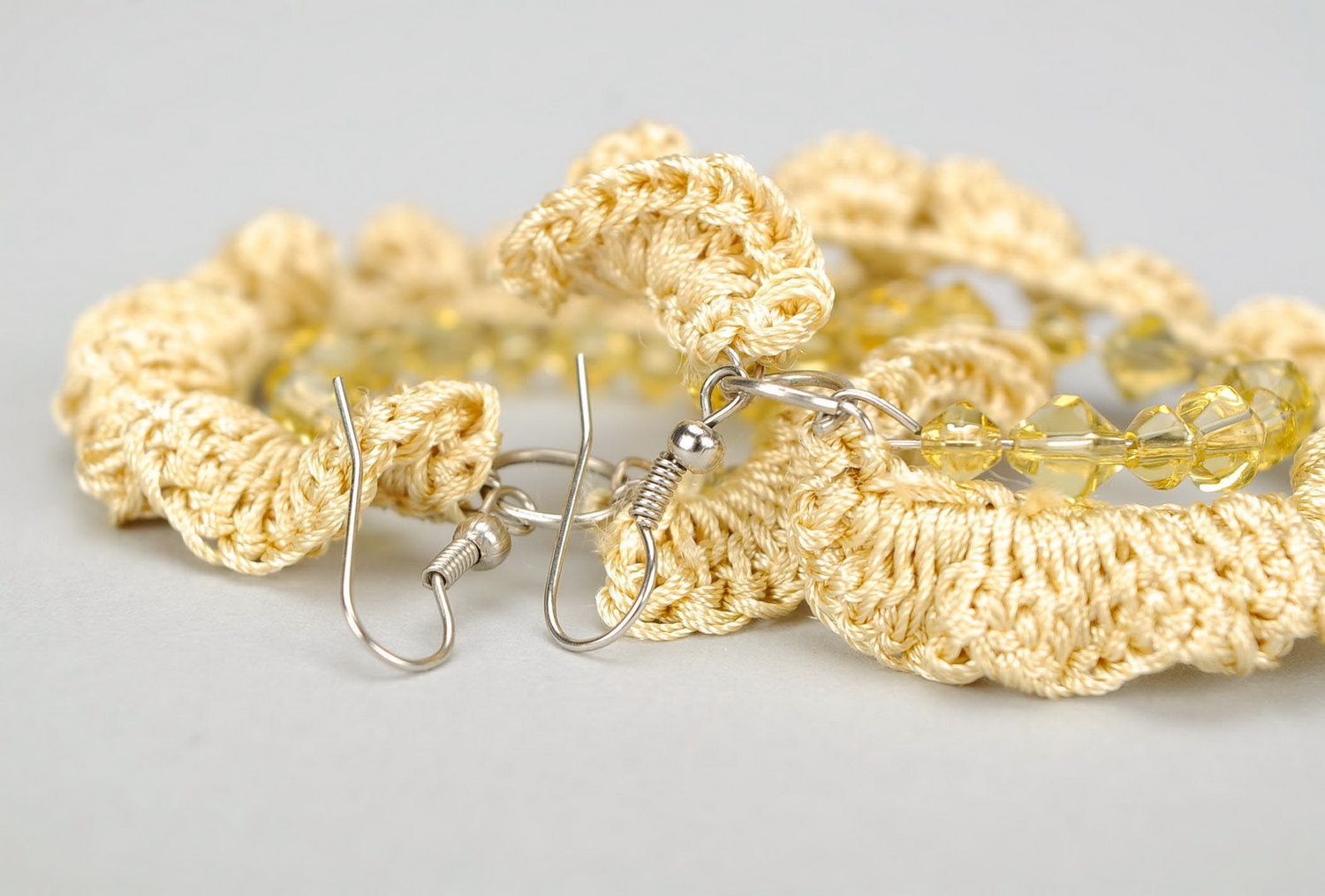 Knitted earrings Vanilla photo 1
