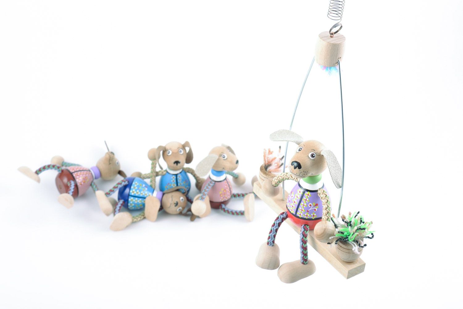 Small handmade wooden eco toy dog on swing for gift photo 1