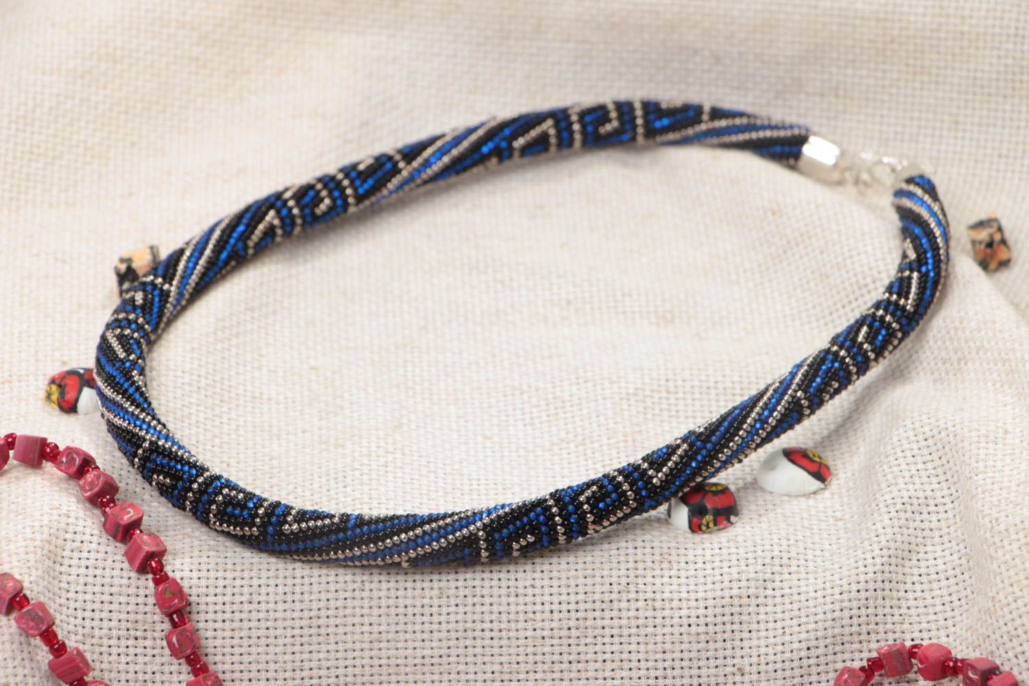 Handmade designer bead woven cord necklace ornamented in dark blue color palette photo 1