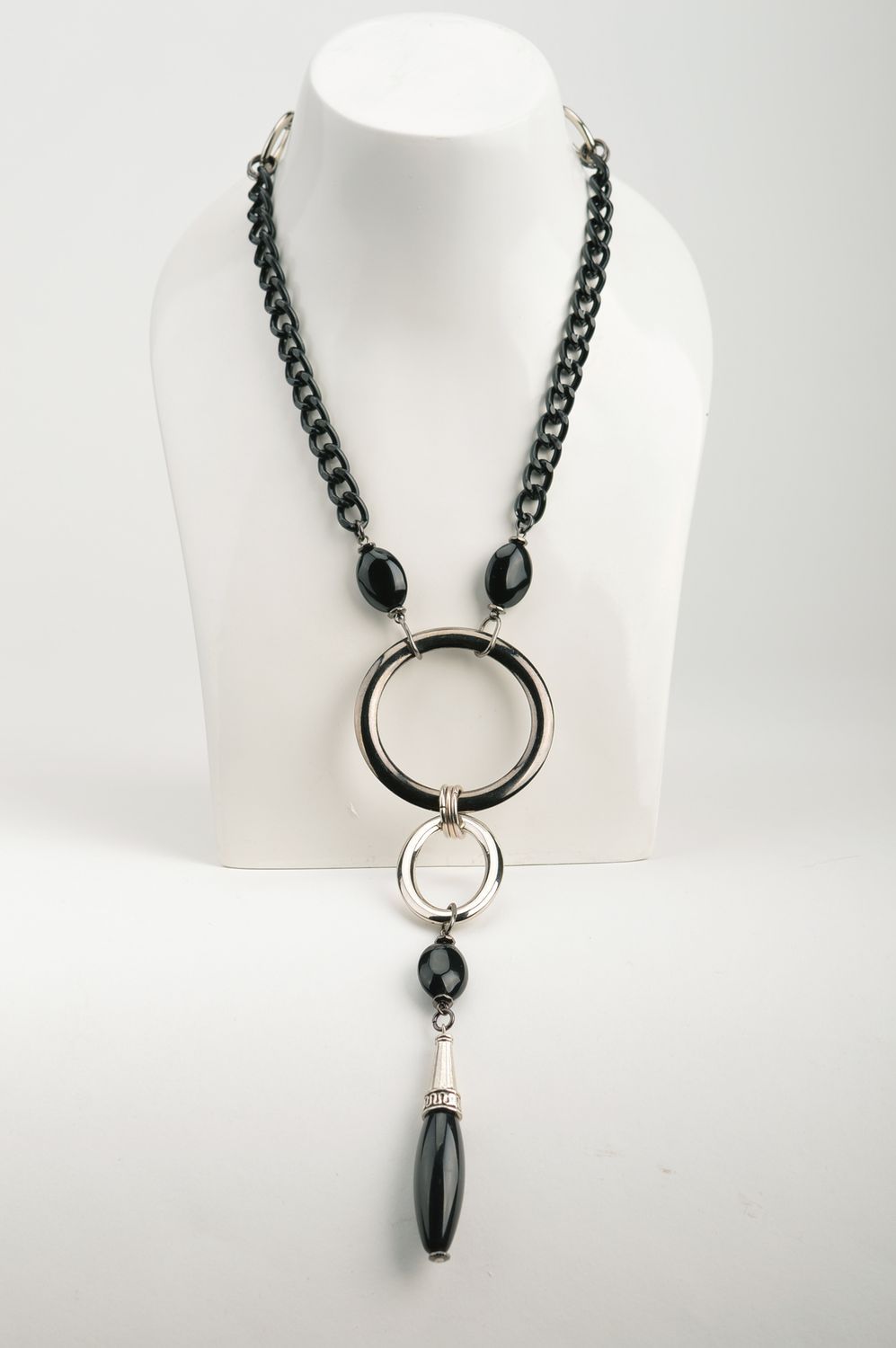 Unusual handmade black and silver colored metal necklace with beads and charm photo 3