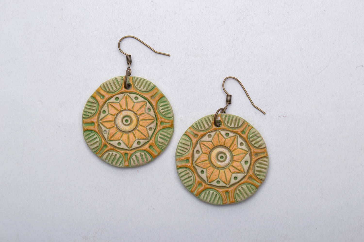 Round clay earrings in ethnic style photo 3