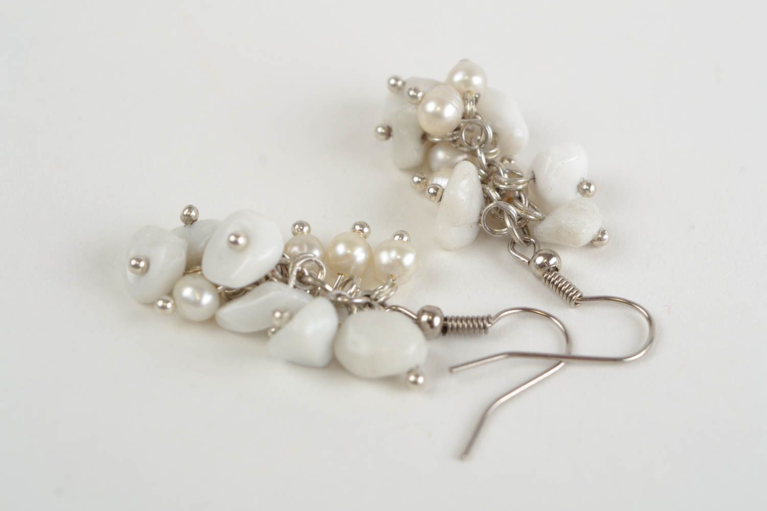 Beautiful handmade women's white woven earrings with natural stone beads photo 5