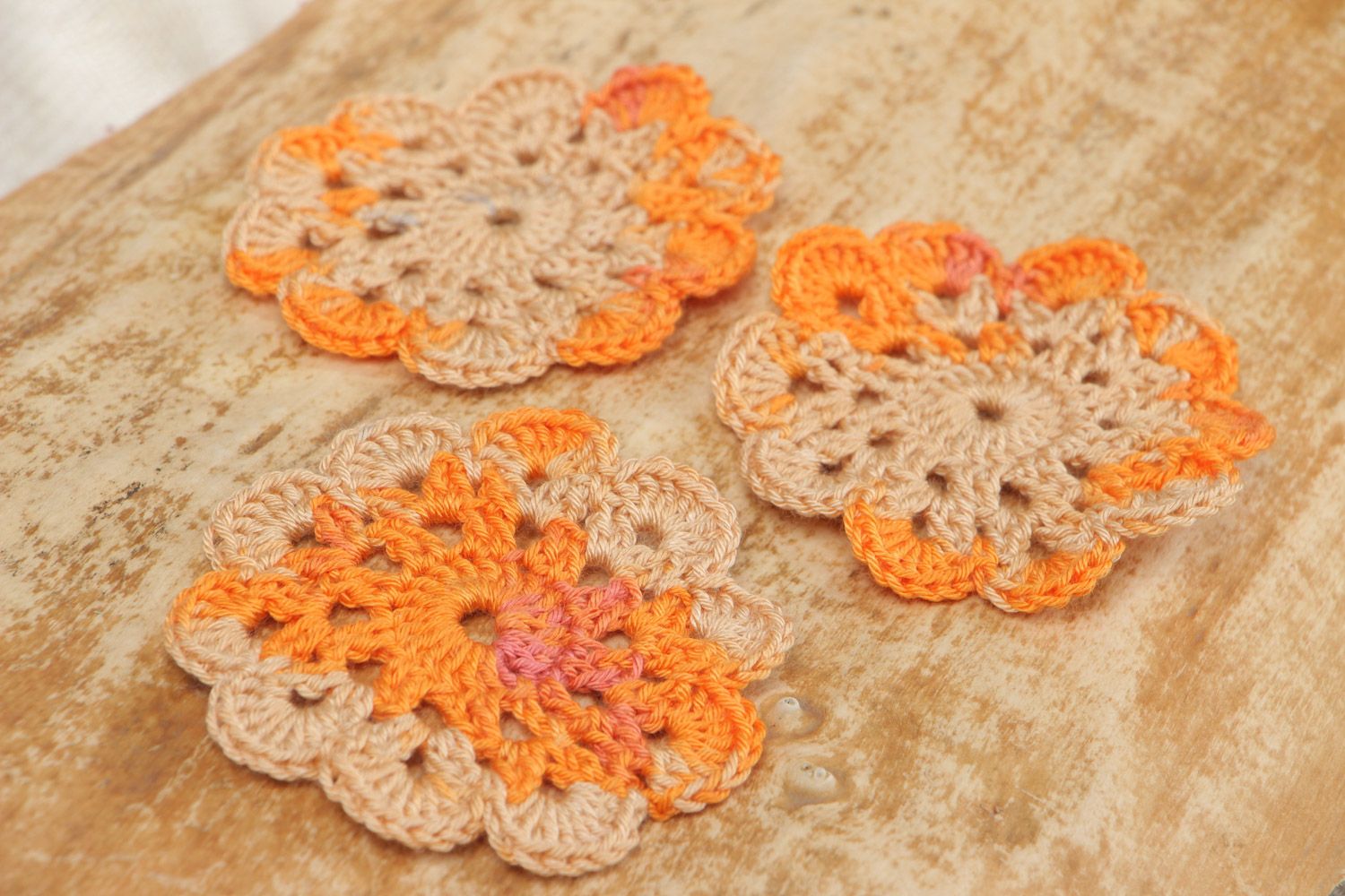 Set of handmade orange crochet cotton coasters for cups 3 pieces photo 1