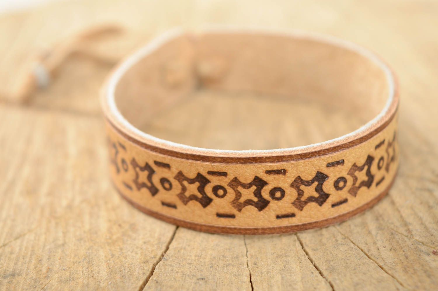 Ethnic light leather bracelet with pyrography photo 1