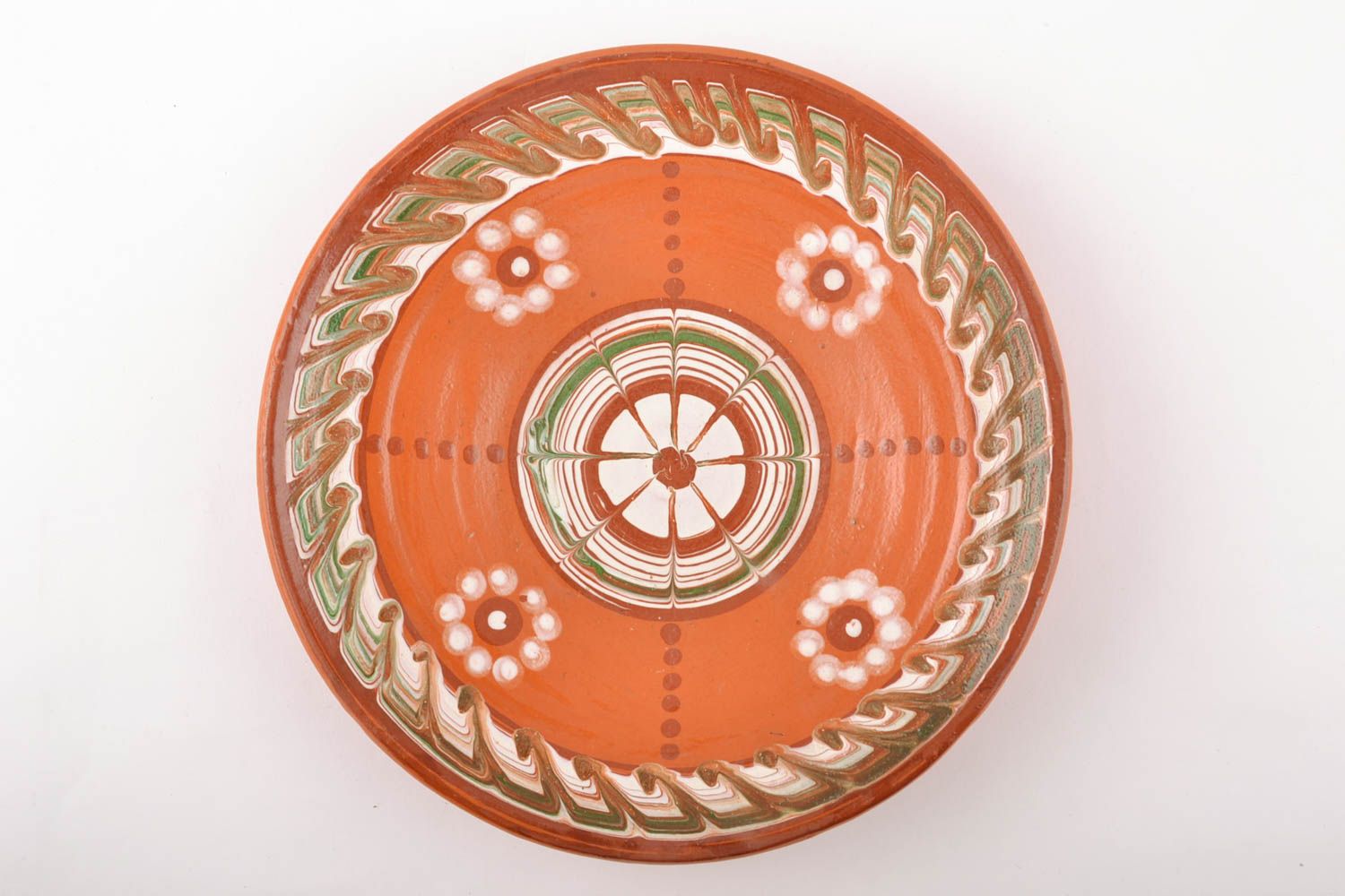Flat ceramic plate with wave-shaped ornament photo 2