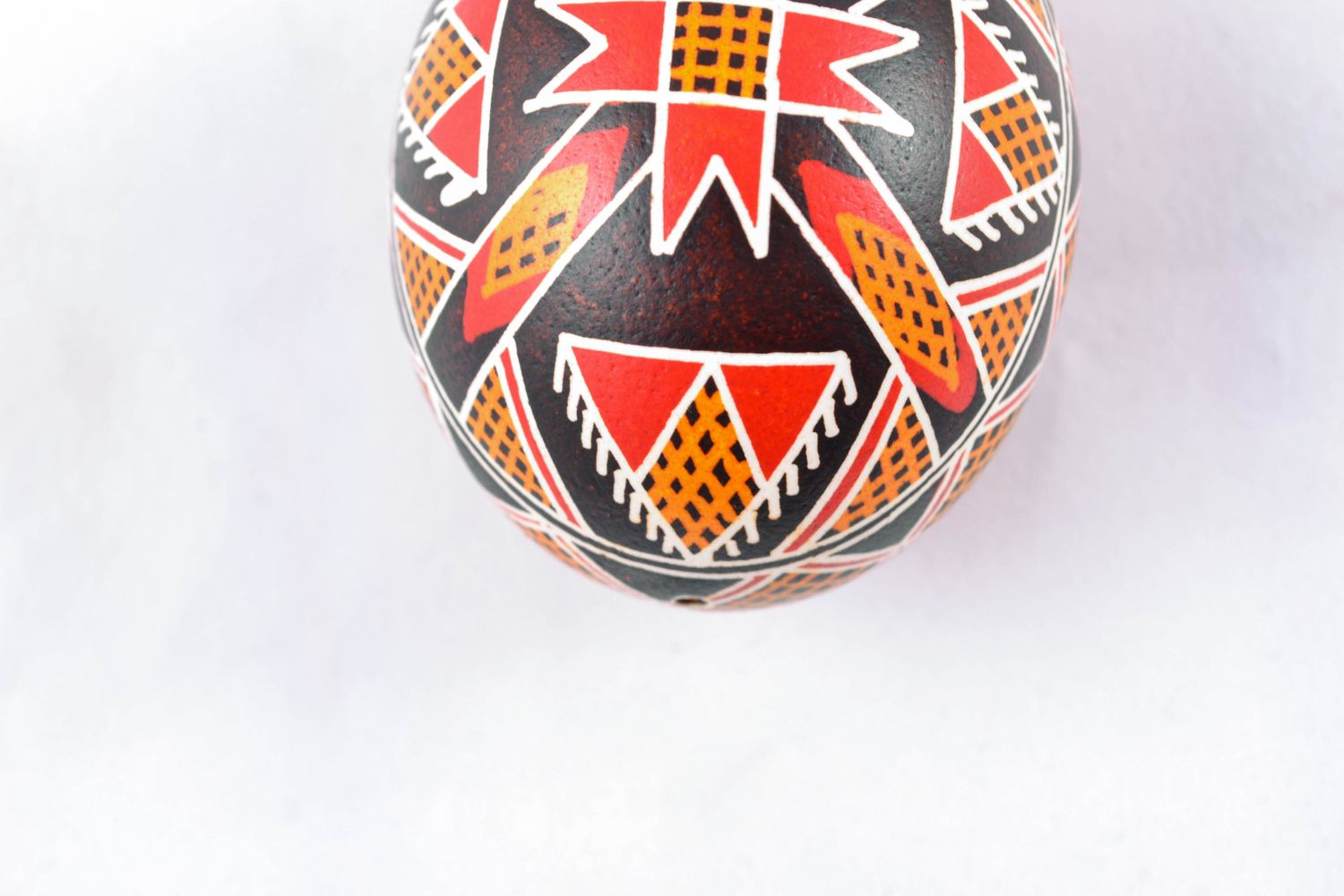 Handmade painted chicken egg with solar symbol photo 5