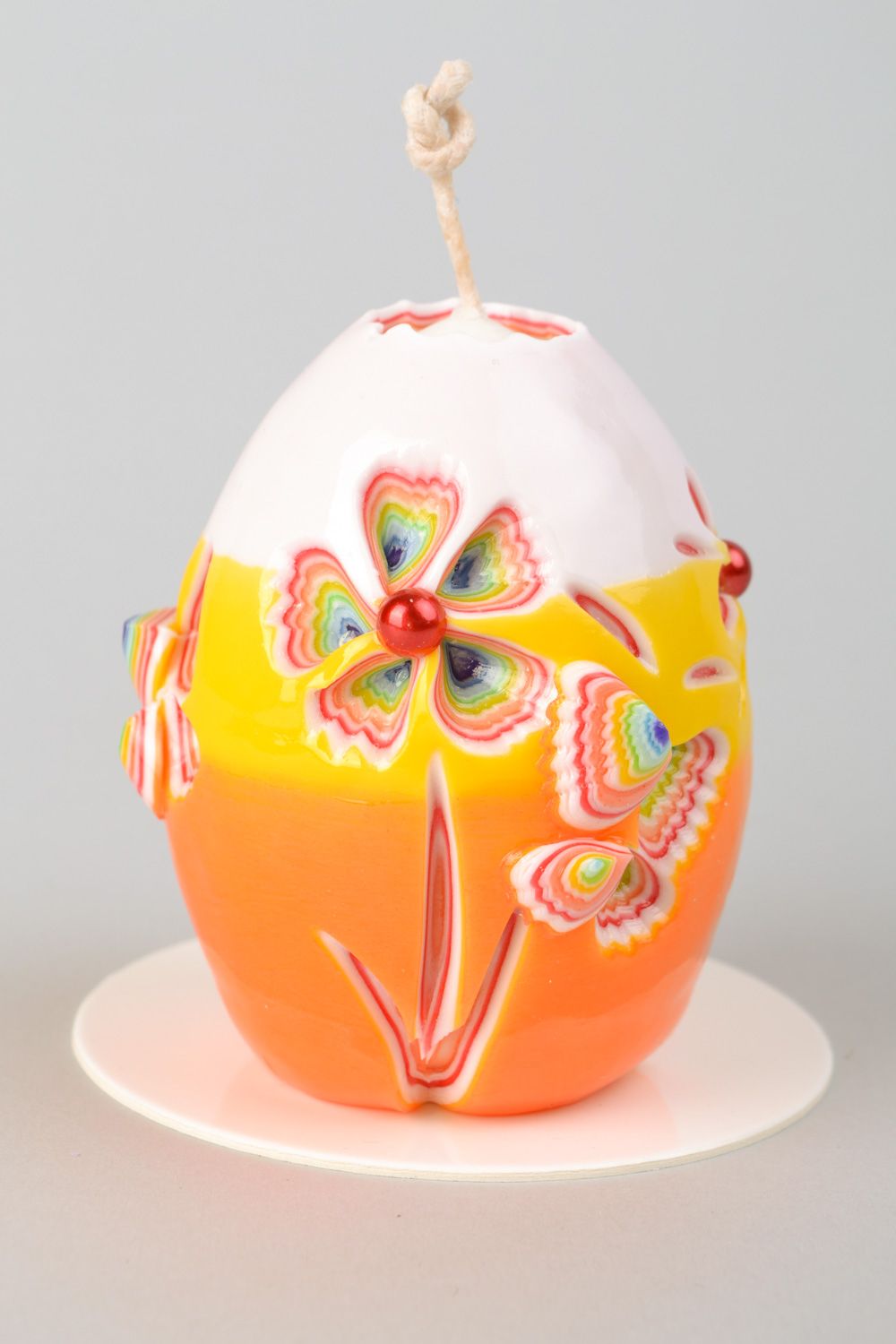 Vela artesanal de parafina con forma de huevo foto 3