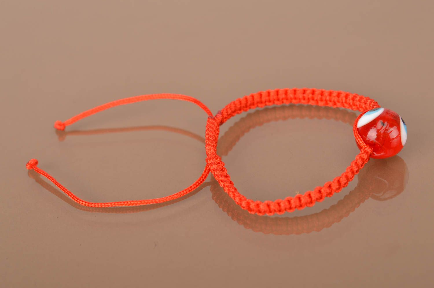 Bracelet tressé rouge en lacet ciré fait main avec perle-œil bijou mode photo 4