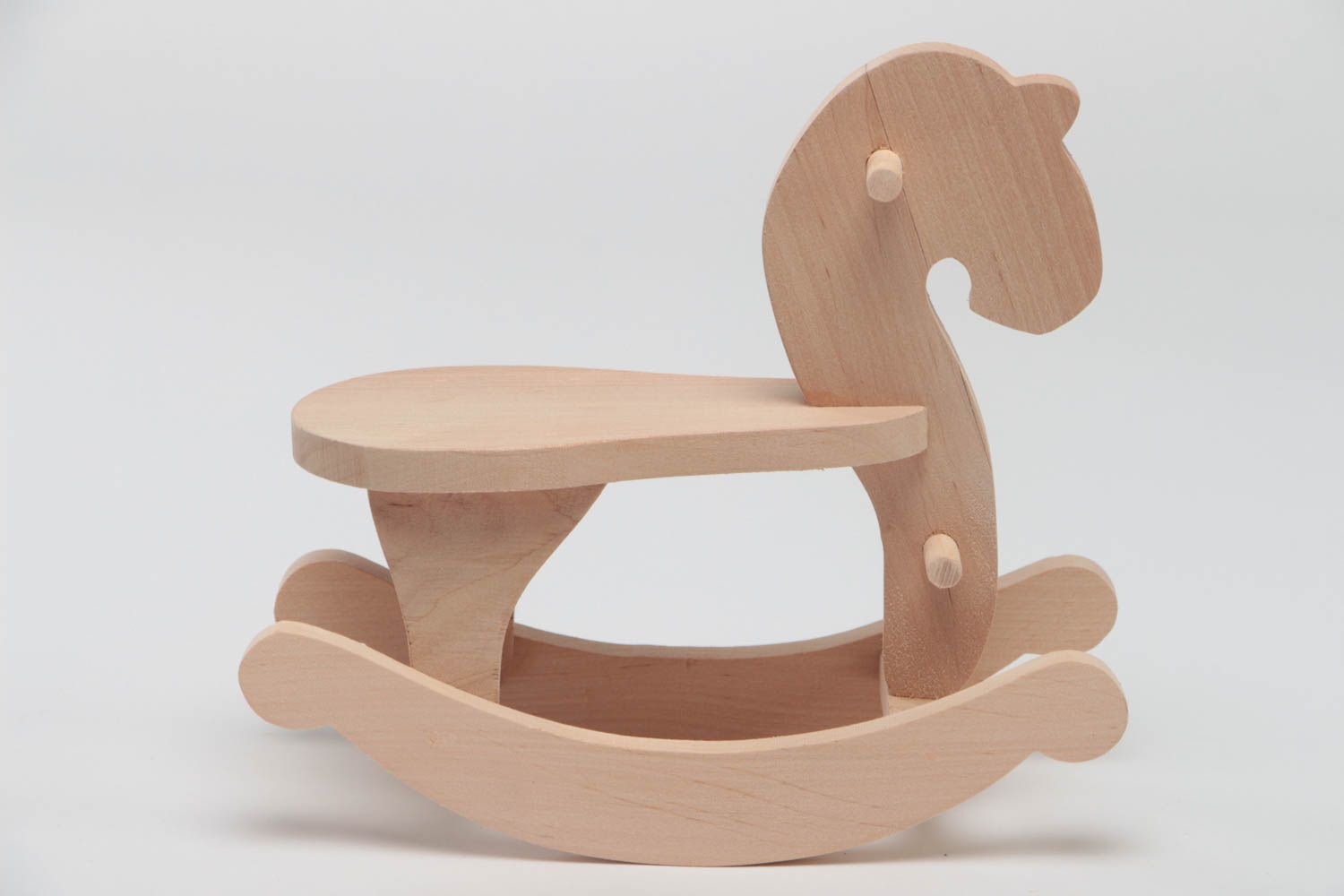 unfinished wooden rocking horse