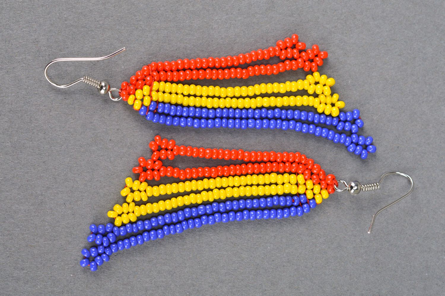 Handmade long bright beaded dangle earrings in yellow blue and red colors  photo 2
