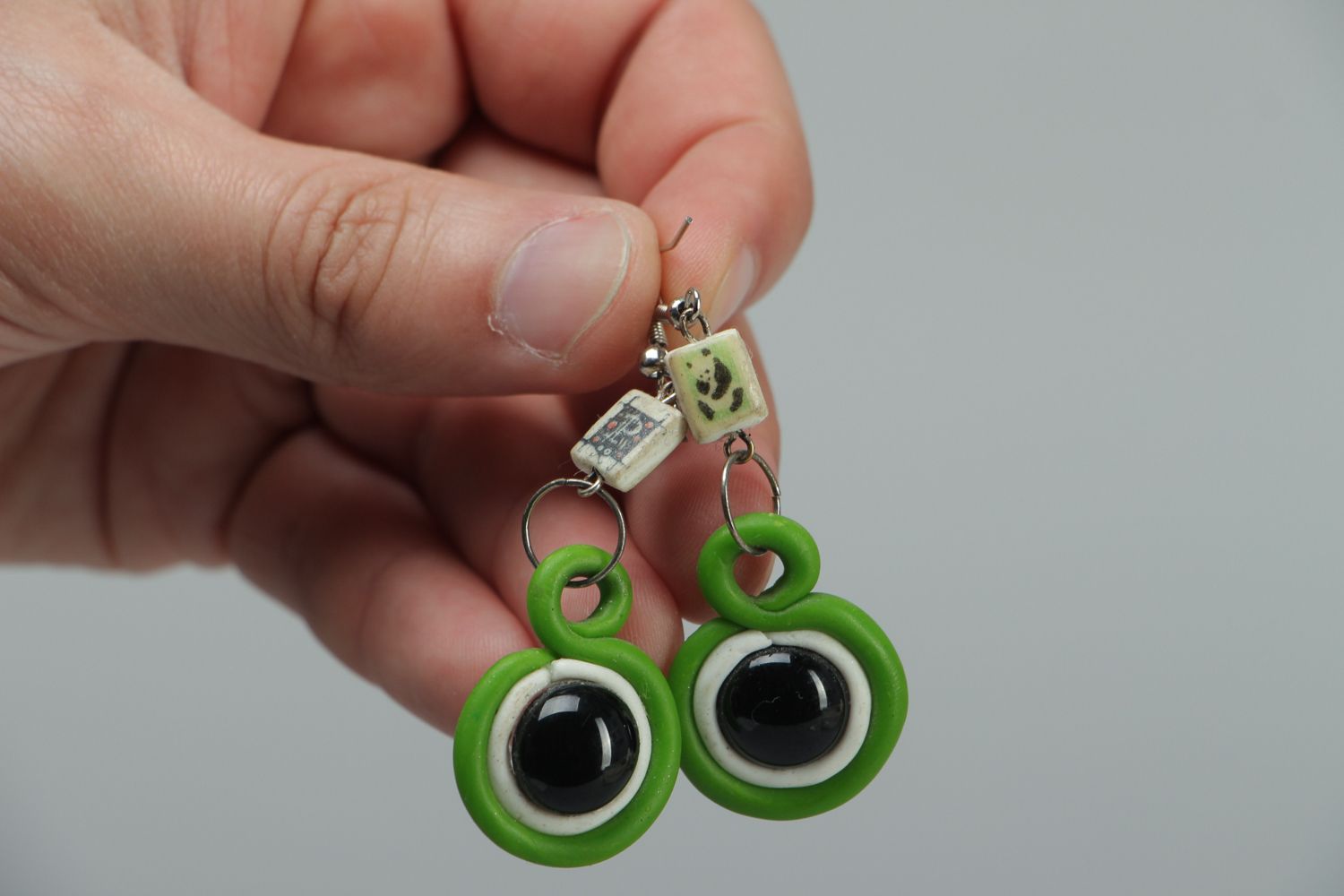 Round polymer clay dangle earrings of green color photo 3