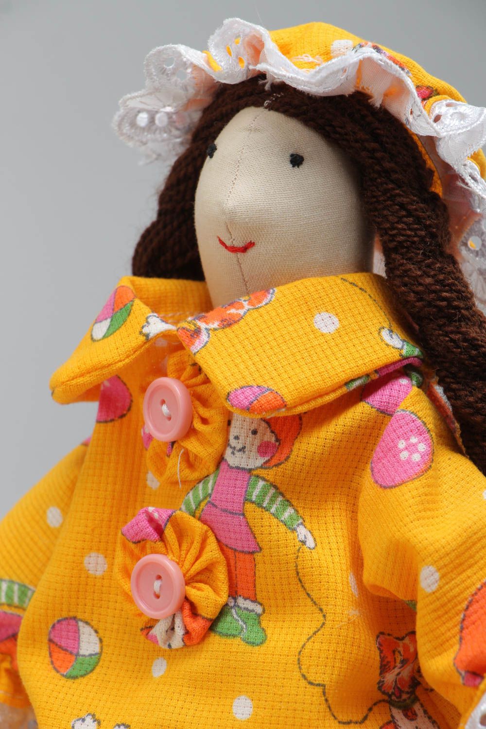 Handmade designer small soft doll sewn of cotton and satin fabric with two braids photo 3