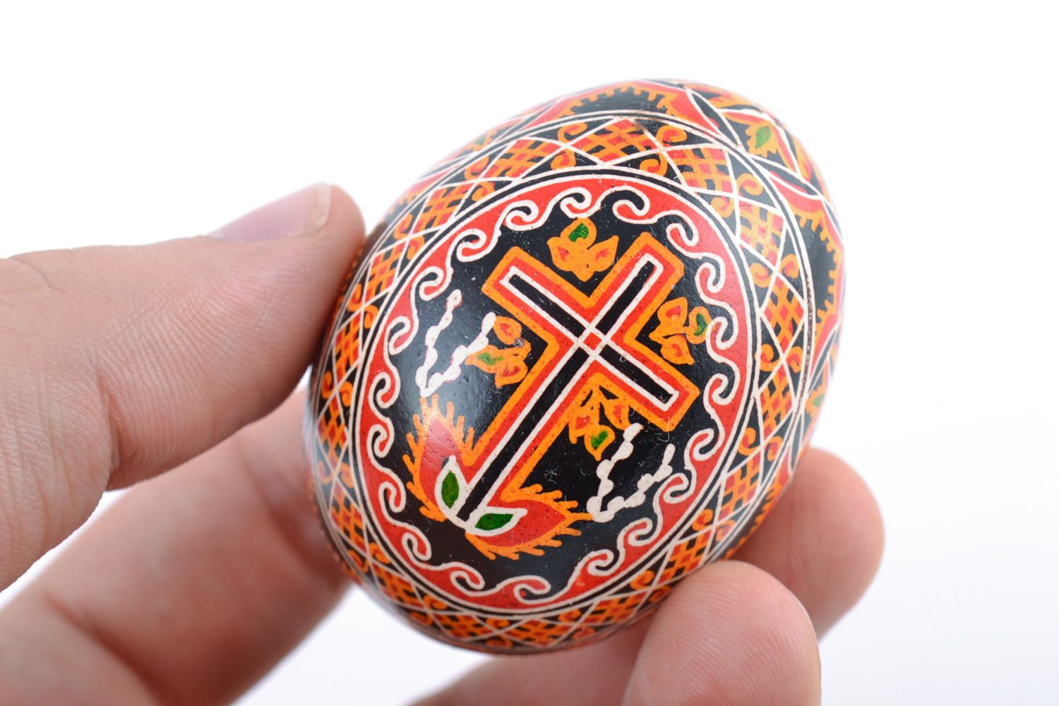 Handmade bright painted chicken Easter egg with images of cross and candle photo 2
