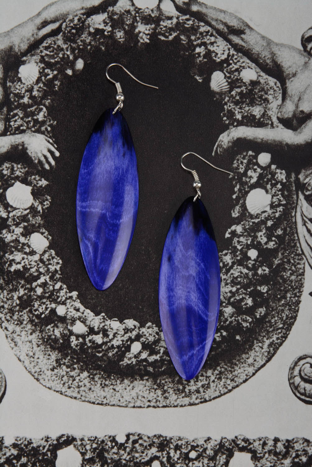 Blaue Ohrringe aus Horn Blatt foto 1