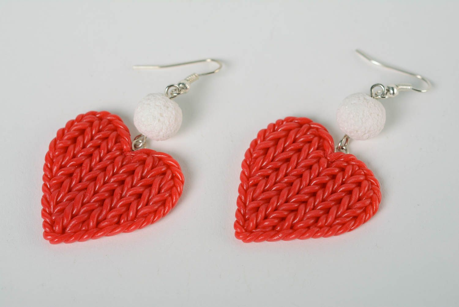 Handmade designer polymer clay earrings in the form of hearts with beads  photo 1