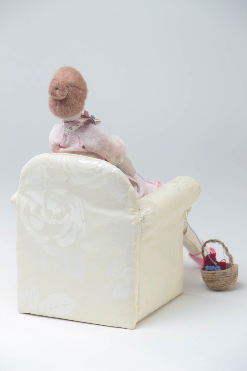 Handmade designer cotton fabric soft doll sitting in arm chair and knitting photo 4