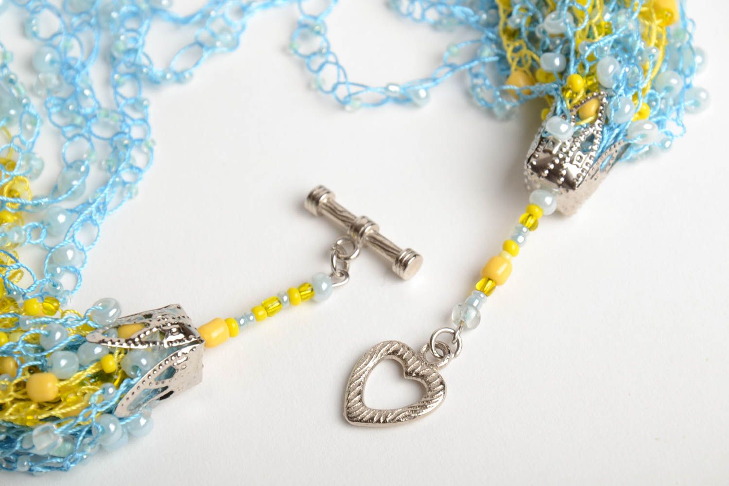 Collier en perles de rocaille multicouche jaune bleu fait main tricoté photo 4