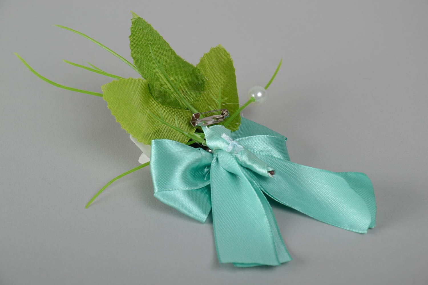 Beautiful handmade boutonniere for bride or groom of light color with flowers photo 3
