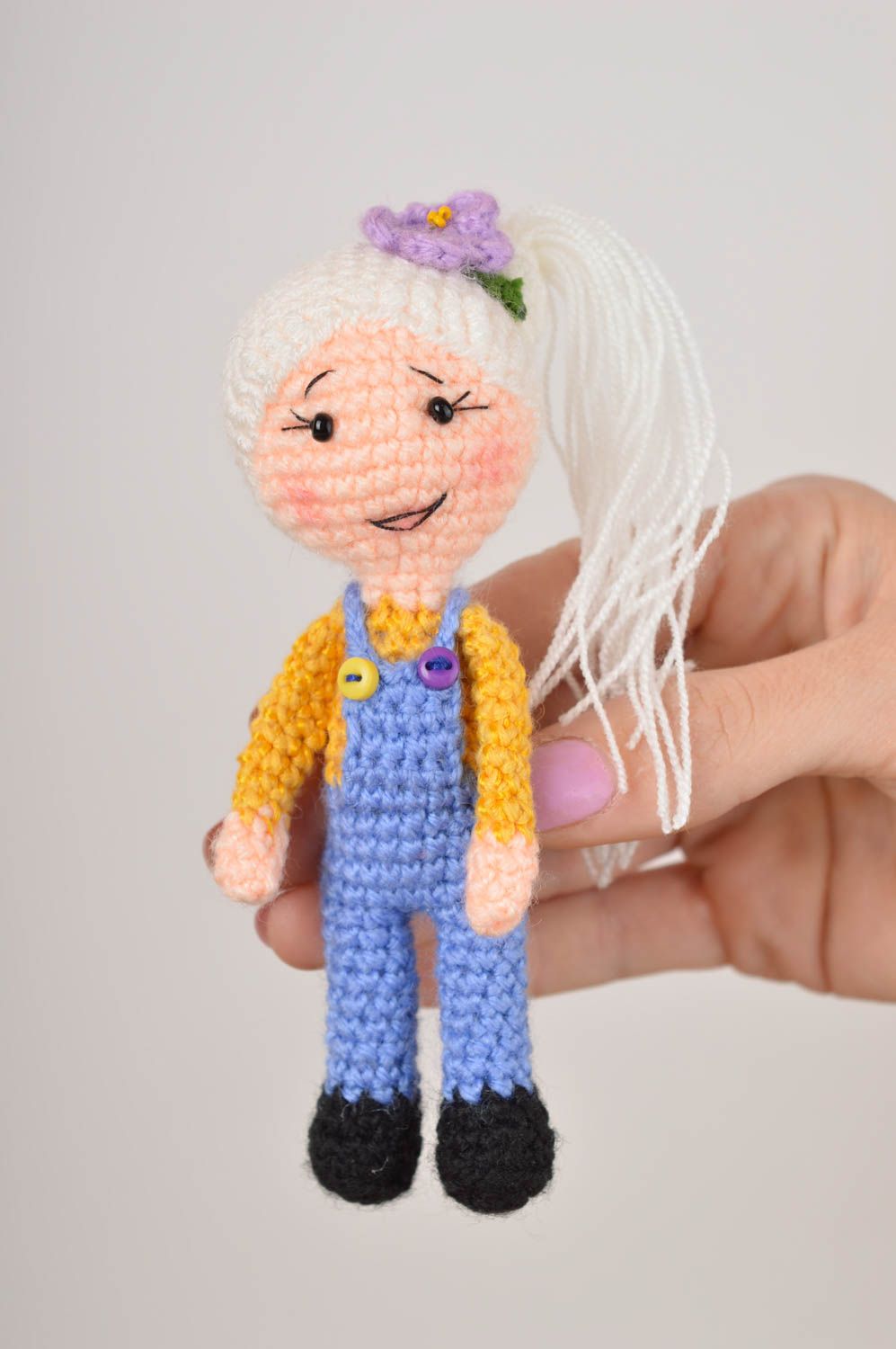 Knitted stuffed girl toy in blue jeans and pink sweater and blond hair. 4 inches tall photo 5
